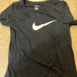 Nike women’s dri-fit black tee with white check! Worn a few times, size medium